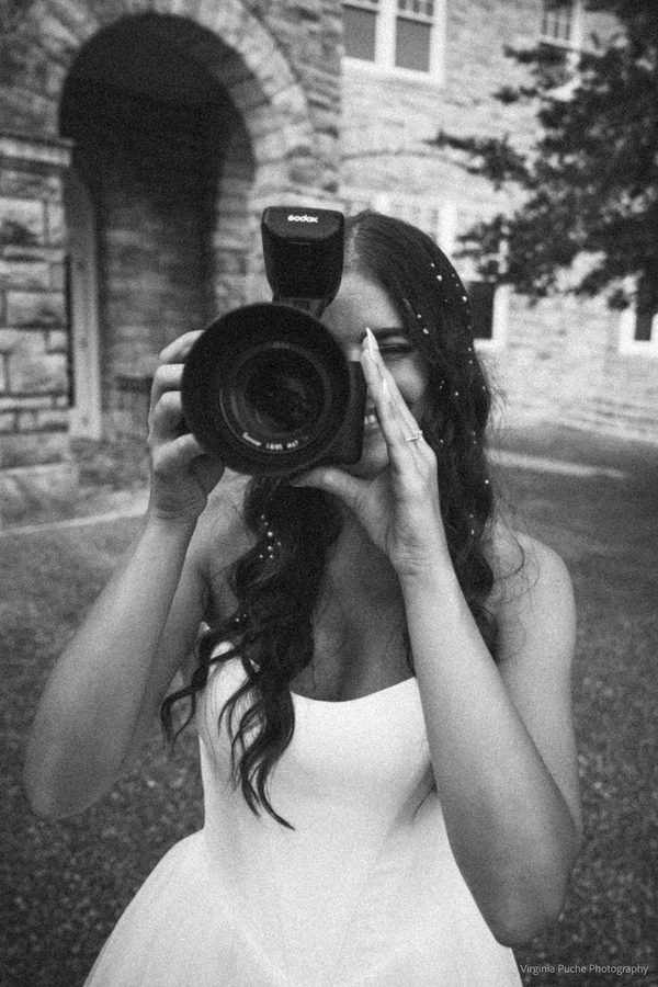 Memphis bride holding a camera, black and white