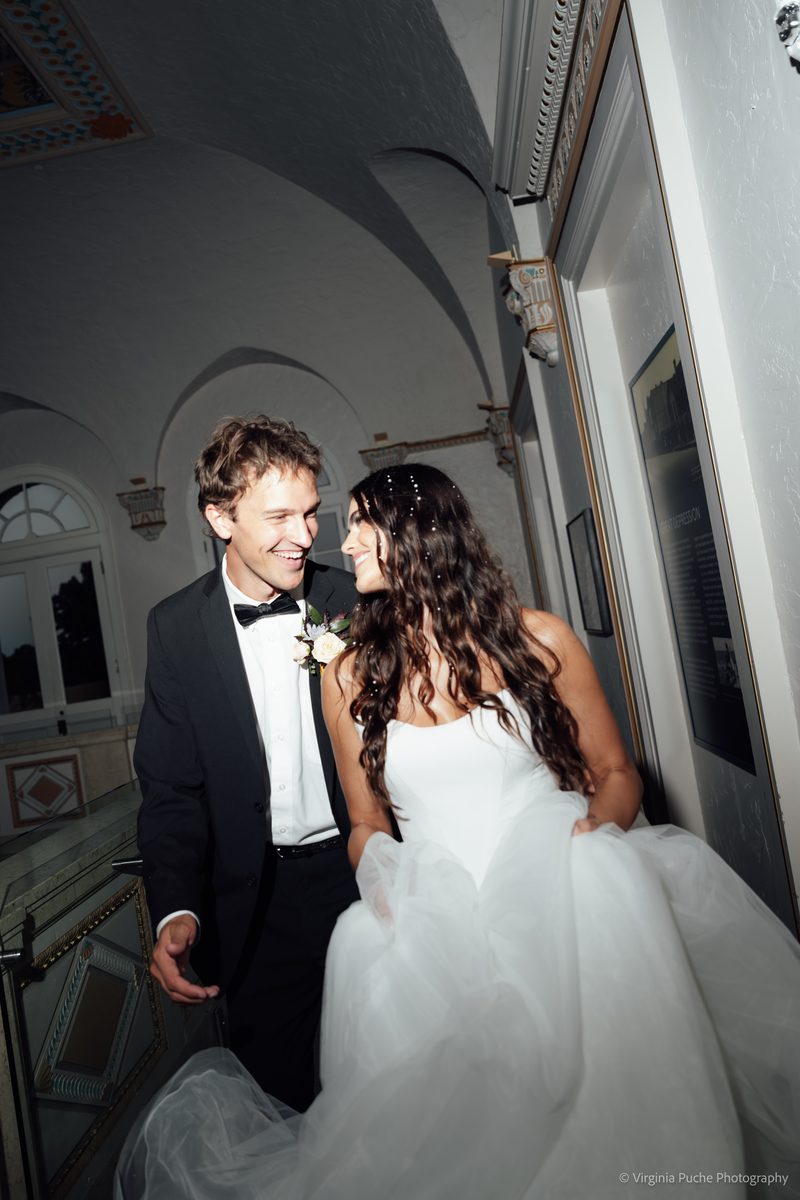 Memphis bride and groom in a candlelit corridor