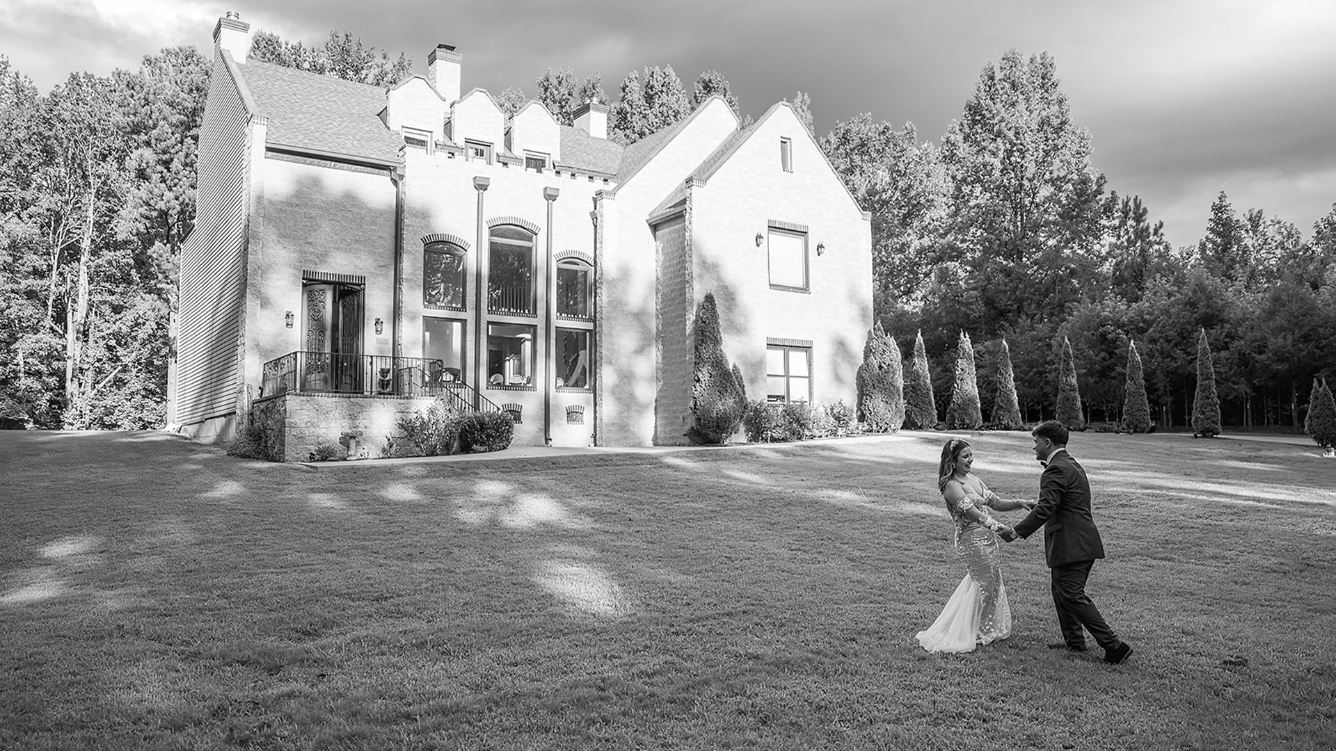 Memphis wedding couple dancing on an estate lawn in black and white