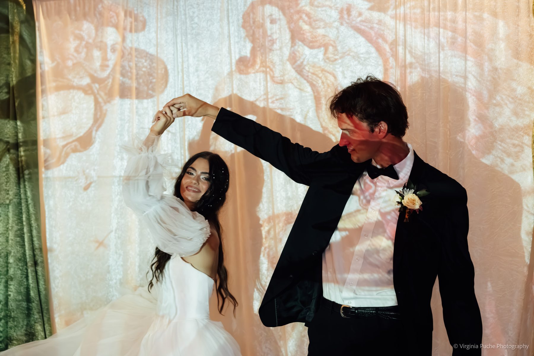 Memphis couple dancing under projected light