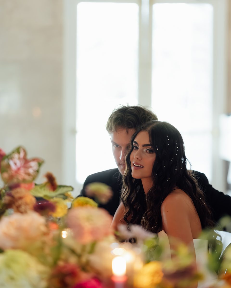 Elopement couple at a candlelit dinner at the Pink Palace Mansion, Memphis